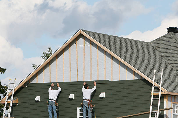 Professional Siding Installation technician working in Cassville, WV